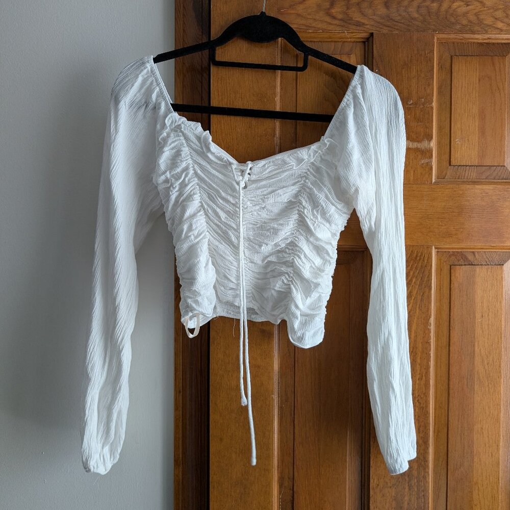 BCBGeneration Boho White Lace-Up Cropped Long Sleeve Top